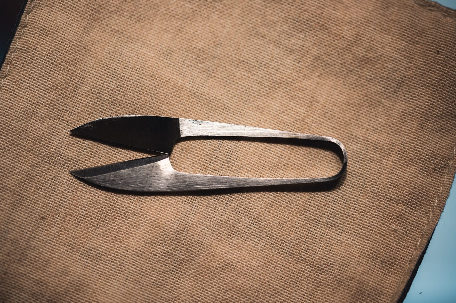 Japanese scissors lying on a cloth