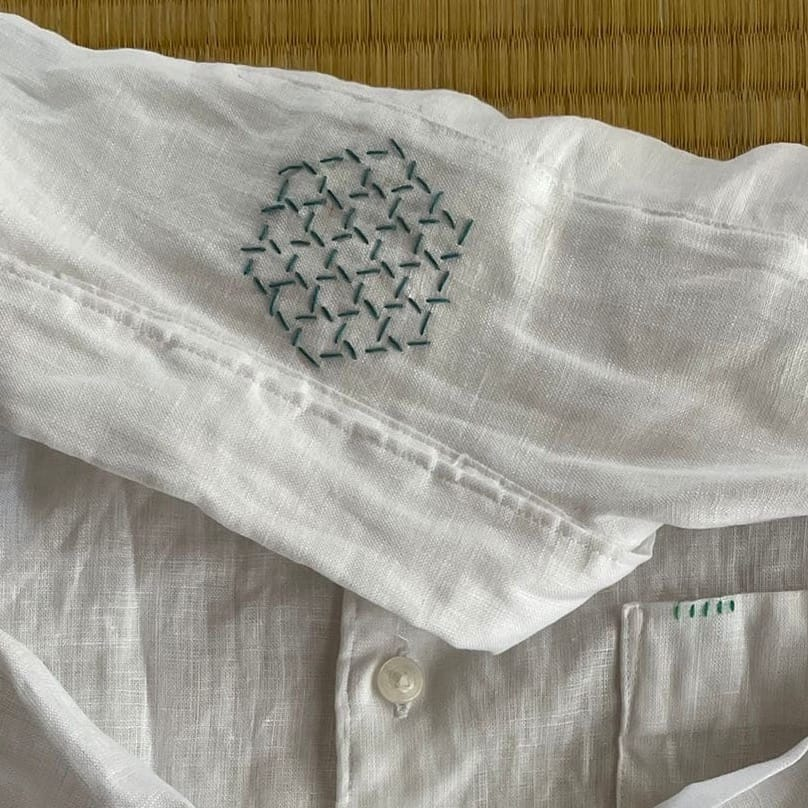 White shirt with sashiko stitches on the back