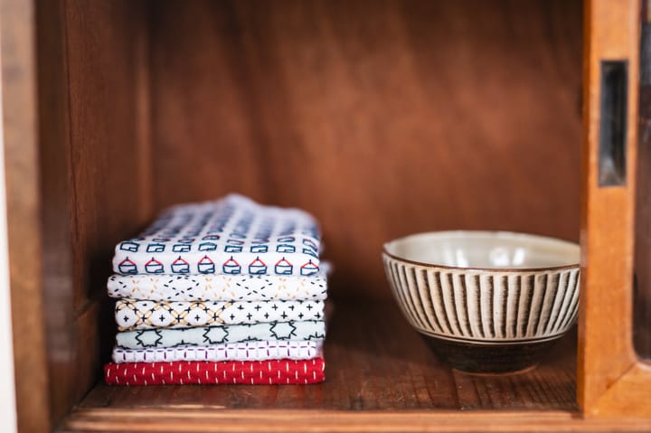 Sashiko kitchen cloths with patterns of varying stitch length